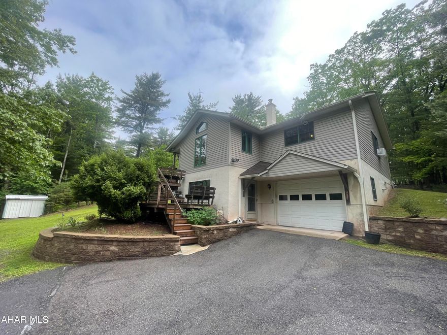 Welcome to Cherry Ridge Cabins!! This sedcluded campground features 5 cabins with various accomendations. The main log cabin home is 2 bedrooms 1.5 bathrooms. A fruit cellar and multiple sheds provide for additional storage.
Outbuildings on the property include a garage, sawmill garage, caboose, sauna, and social hall. Social hall has seating for 75 people with kitchen and restrooms.
Also included is a 3 bedroom, 2 bath raised ranch home with open-concept layout. Addtional amenities include a 1-car integral garage, detached carport. 
Property is easily accessible with two private paved driveways. Signage at bottom of drive. This property is a must see! Lots of potential.