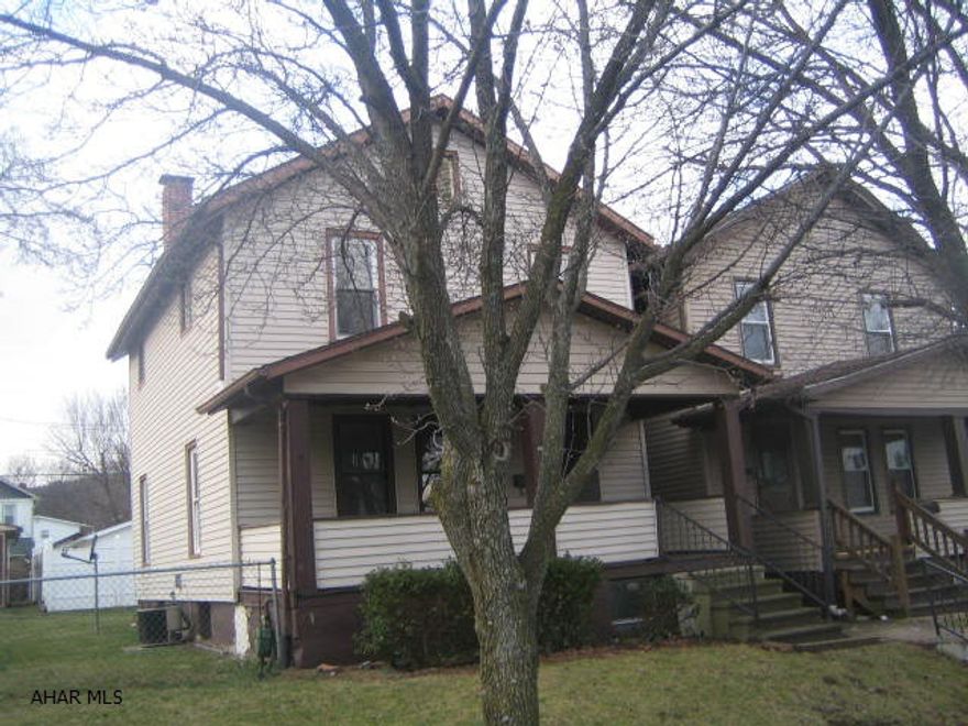 2 Story vinyl home with vinyl tilt windows, large living room, formal dining room and oak kitchen. Nice covered front and back porches, level lot and 1 car detached garage. Needs some TLC, but could be a perfect gem! Property sold as-is. Seller will make no repairs. Offers must be submitted through HUD approved broker. Buyer pays both transfer taxes. Marketed by MMREM.com. More properties at www.HUDhomestore.com. Exclusive agency. Equal Housing Opportunity.