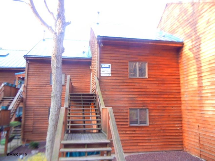 easy living. 2nd floor Cedar unit. Condo fee which is $250 monthly includes outside maintenance, lighting, trash removal, snow removal for road, water & septic. Well shared-septic shared.