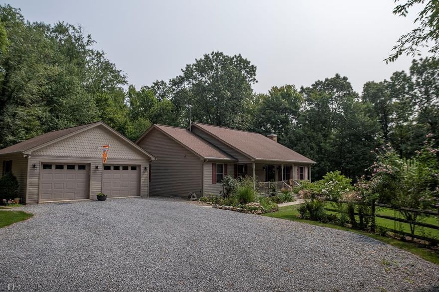 Escape to the country in this 3 bedroom, 3 bathroom single-level home custom built in 2007. Situated on a private 3.87 wooded lot this property has it all, including a 2 car garage, 2 sheds, various fruit trees, and even a chicken coop. Inside you will find an open concept kitchen with hickory cabinets, formal dining room, vaulted ceilings and solid oak trim & doors. The master bedroom has two closets and a large master bath. This four season room leads out to a deck with a hot tub and the finished basement walks out to a patio that is perfect for entertaining. The home has 3 sources of heat (electric heat pump, oil in floor radiant and a wood stove) and 5 heat zones. Check out our 3D virtual tour and schedule a showing today.
