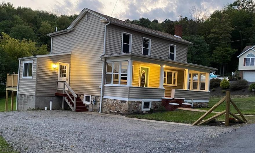 Beautifully updated 2 story home on the corner of Palm Spring Lane. Large Lot. Just refinished hardwood floors. Recessed lighting throughout. Large covered front porch. New refrigerator. Newer built in gas range and dishwasher. Double pane windows. New roof and siding.