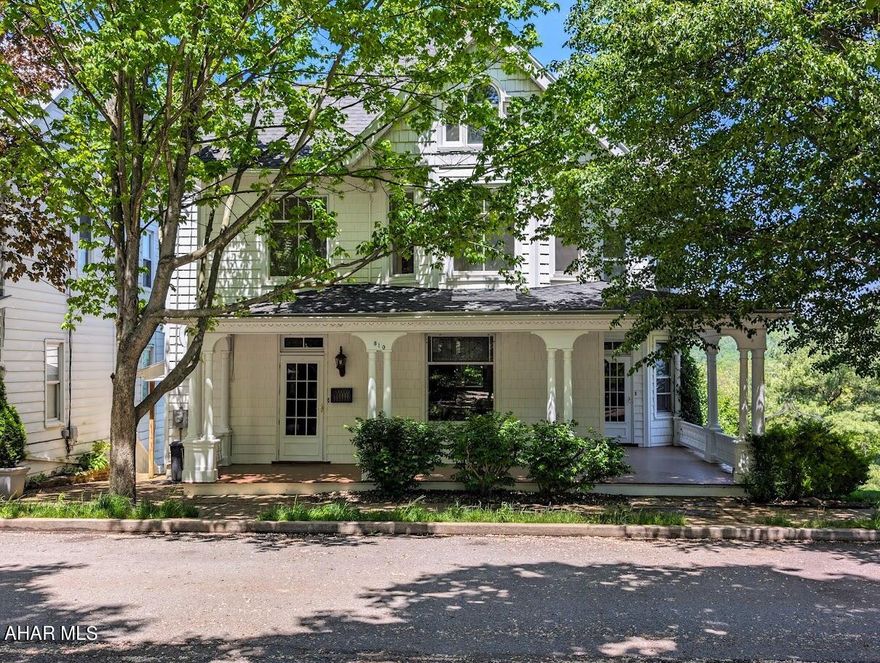 Step into the charm of yesteryears with this grand four-bedroom home nestled in the heart of Saxton. Boasting a blend of timeless elegance and modern comfort, this residence welcomes you with hardwood floors and brand new carpeting, offering the perfect balance of classic and contemporary living. Both bathrooms have been elegantly updated, ensuring a seamless fusion of style and functionality. Outside, a large covered wrap-around front porch beckons for lazy afternoons and warm gatherings, while inside, discover the coolest staircase leading to the upper levels, adding a touch of architectural brilliance to the home's design. Admire the intricate details of the stained glass window, casting colorful patterns across the living space and infusing the room with a sense of warmth and charm. Situated on a double lot on a picturesque street, this home exudes character at every turn, inviting you to create lasting memories in its storied halls.