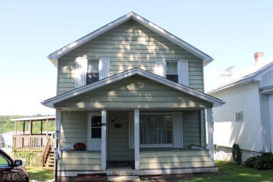 Move in ready home in the Lakemont area!  Enjoy Lakemont Park/Curve fireworks from the large 14'x11'9" cover deck, off street parking, partially fenced yard and 2 car concrete block detached garage with heat that can be accessed from the alley.