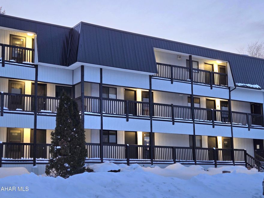 There's lots of room for you and your friends in this 3rd-floor 2-bedroom 2-bath fully-furnished condo with counter bar seating, sleeper sofa, washer + dryer, balcony, located across from the tennis court + outdoor pool. Also included is the blink door bell w/speaker system at main door + keyless entry. Non-functioning fireplace - see Seller's Disclosure.  Enjoy the amenities of this 4 season resort. $342.00 monthly association fee includes outside maintenance, road maintenance, tennis, hottub, outdoor pool, indoor pool, sauna, exercise center + trash removal. (Skiing + golf for a fee). J-677