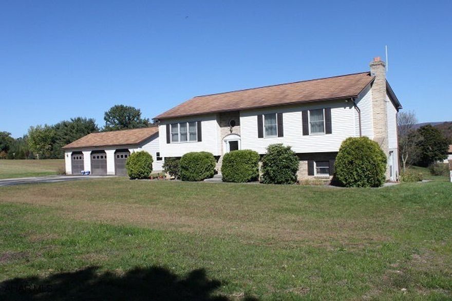 Spacious bi-level on a semi-private 2 acres, with a 3 car detached garage in Bedford township. 4 bedrooms, 3 baths. Fully finished lower floor with very large family room area complete with wood burner and bar area. Large back deck has been recently refinished. Additional 14x20 shed goes with property as well. Move-in ready. Call today to make this home yours!