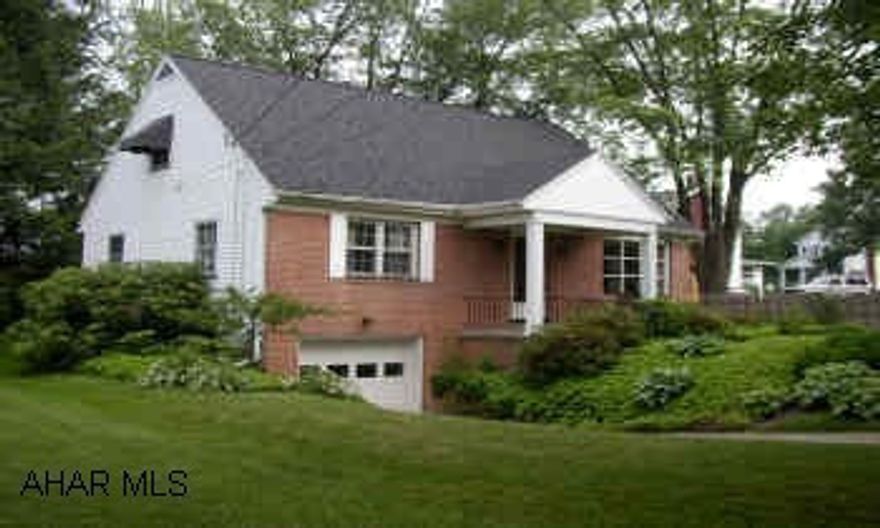 CHARMING CAPE COD ON WELL LANDSCAPED LOT.  SUNROOM 12X15 WITH VAULTED CEILING AND TILE FLOOR.  METICULOUS!  HARDWOOD FLOORS, PLASTER WALLS, NEWER KITCHEN, CHARMING SUNROOM (ADDED).