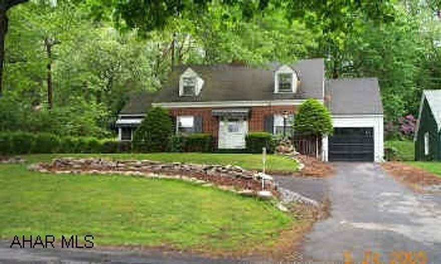 New kitchen, painting, driveway, additional room off BR, could be 3rd captive BR, wood floors, wooded back yard