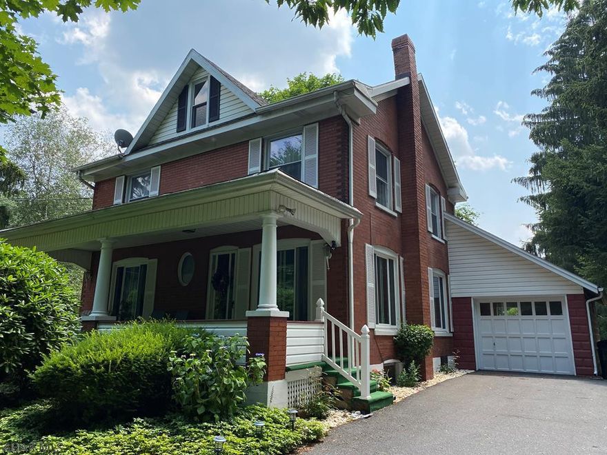 This 3 bedroom, 2 bath home in desirable area of Greenwood is the definition of peaceful. All sitting on an acre of flat land with mature trees, landscaping, and a garden. New, plush carpet throughout and freshly painted upstairs. The first floor offers 2 living spaces for entertaining. All appliances stay in home, including new SS refrigerators in kitchen and sunroom. The back of this home features an enclosed sunroom to enjoy summer evenings. If the sunroom isn't enough, kick back and relax on the expansive front porch. Newer windows throughout. 1 car attached garage and carport alongside of paved driveway. Don't miss your chance to live in one of the best areas of Altoona!