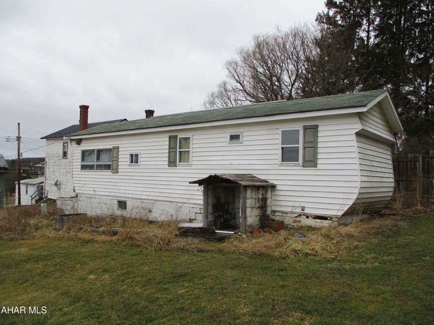 This is a vacant property in Ramey. It consists of two parcels with one having an old mobile home on it. Public water and sewer available. There is an old mobile home on the property that is not safe to enter. No interior showings. Seller does not know if they have the title or details of the mobile home. Buyer would be responsible for mobile home post closing. Property comes with 2 lots for a total of 1/4 acre per county tax records.  All taxes, square footage, and land quantities are estimated. Buyer to verify amounts.