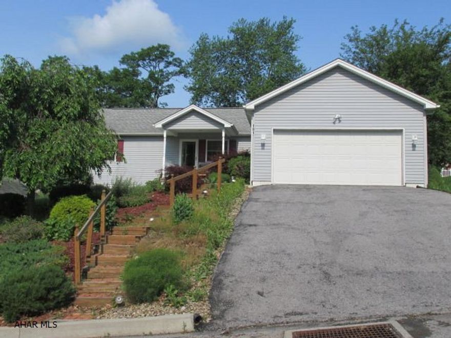 3 Bedroom, 3 bath rancher, newer construction with open floor plan, kitchen island, gas fireplace in family room, hardwood & ceramic floors, large basement, covered back deck, 2 car garage.