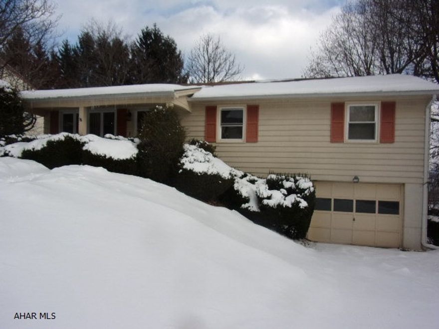 Opportunity abounds in this affordable rancher in great Highland Park neighborhood!  Oak kitchen with appliances, modern ceramic bath, and three bedrooms on first level.  Large family room and 1/2 bath on lower level.  Integral garage.