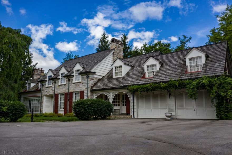 Don't miss this original Hollidaysburg charmer. This property features so many unique qualities including custom original woodwork and molding, pocket doors, original hardwood flooring, and so much more. The home also features a high end kitchen upgrade with sub zero refrigerator. The large bedrooms on the second floor along with storage above the garage are just an added bonus. On the exterior this mature private lot and in ground swimming pool make outdoor entertaining a breeze. Add your finishing touches and charm to make this house your home. Call listing agent for your private tour today.