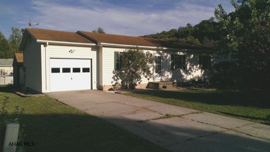 Three bedroom ranch vinyl sided home that is situated on a 80 x 112 lot with a large shed for storage. This home also features a one car attached garage.