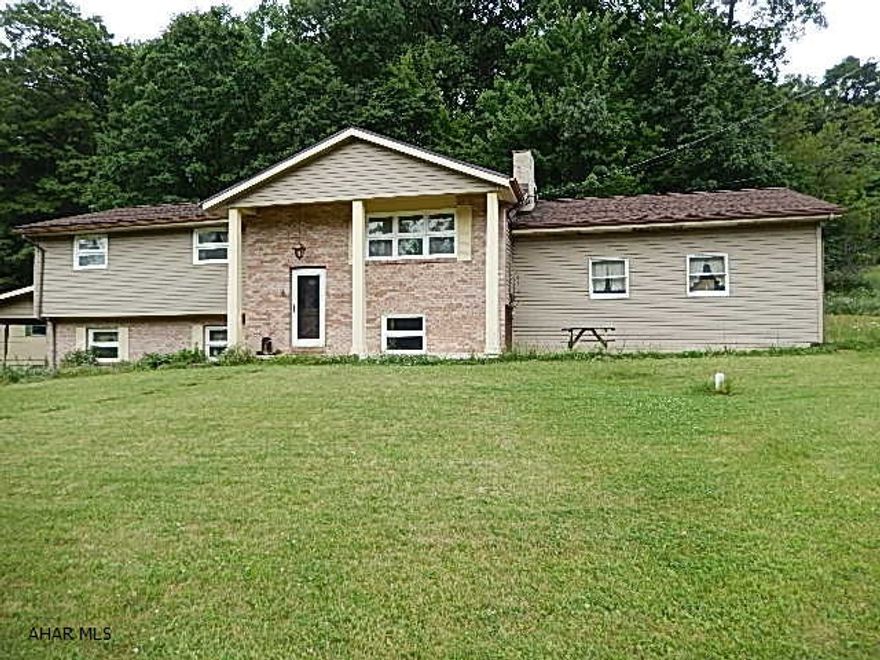 Location, location! This 3 bedroom is on a gorgeous setting in Sinking Valley. Large 1.4 acre lot offers an abundance of privacy! Home offers living room with stone, wood burning fireplace, master with 1/2 bath and huge walk-in closet and family room in the lower level. Attached 2+ car garage. Home needs TLC, but priced to sell.