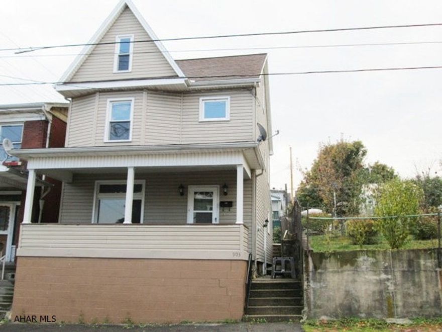 Don't miss this one.  Newer vinyl siding, new tilt-in windows, all new electric, new carpet and flooring.Nicely updated kitchen with large pantry area.Second floor has 4 bedrooms and third floor is heated for a fifth bedroom.  Private rear patio.