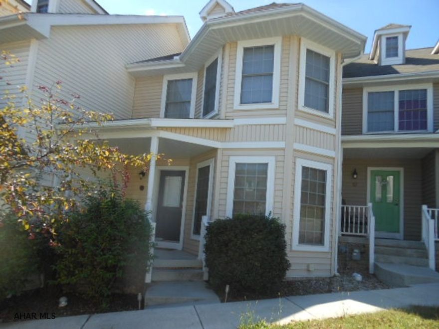 Great Townhouse in Holliday Hills! Large living room open to dining area and kitchen opens to back deck with great views. Lots of recessed lighting. 2nd floor has 2 nice bedrooms, one with its own private bath. 3rd floor has electric and insulation and ready to be 3rd bedroom or playroom. Private patio and yard with a 2 car garage.