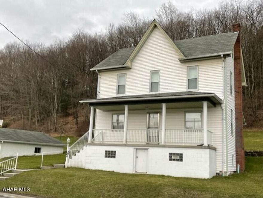 Well-built 4 BR home on a large double lot. Covered front & back porches. 2 car garage & very clean basement. Priced to sell!