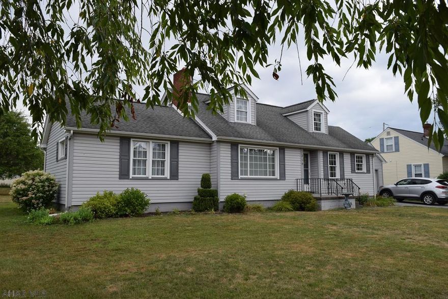 Cape cod home with first floor primary bedroom suite! This wonderful home features an updated kitchen, with newer to brand new stainless steel appliances. Along with the primary bedroom, there are three additional large bedrooms, one of which is upstairs, and another full bathroom on the first floor. Basement is very spacious and open for storage or future finishes. Lovely covered porch for summertime sittin'.