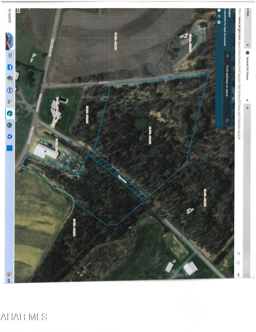 Wooded acreage with lots of road frontage. Building site with preliminary sand mound approval.  Timber value here. Nice rural location with privacy. Some of the site is hilly. Pond on site.