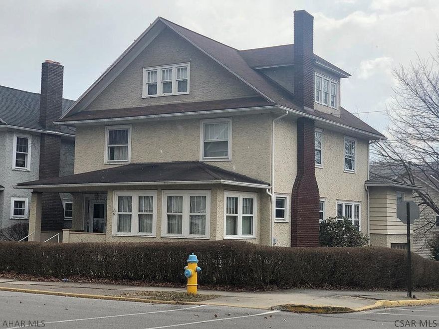 Come tour this 5 bedroom 2 full bath home in the heart of Windber! Property features include hardwood floors throughout the home that flow into a spacious living room with wood burning fireplace & built-ins, separate dining room; and 1st floor en suite off of the dining room. The second floor offers 4 bedrooms, full bathroom and access to the third floor which presents another 4 potential bedrooms and half bath. Also enjoy the front covered porch & off street parking on 13th street as well as a one car integral garage. Ask about a 13 Month Home Warranty! Call today to schedule your personal tour!