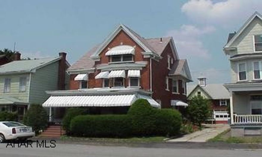Huge 11 room, 4BR, & 2 3/4 bath. Classy brick w/original woodwork & lead stain glass.  New insulated windows thru-out.  Elec upgrade & cleaning in process.  2sty oversized 2-car garage w/workshop. 2nd kit /3rd floor. Non working fireplace. Huge 11 room. 4BR, & 2 3/4 bath.  Classy brick w/original wood work & lead stain glass.  New insulated windows thru-out.  Elec upgrade & cleaning in process.  2 sty oversized 2-car garage.  2nd kit on 3rd floor.  Non-working fireplace.