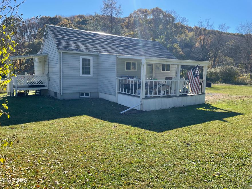 Looking for acreage and peaceful country living? Then here is a sweet 1 story home situated on 2.26 acres. The exterior is vinyl sided with a covered front porch. There are 2 bedrooms and a full bath. The kitchen has room for an eat-in space, plus a main floor laundry room. There us a newer forced air, oil furnace and 200 amp electric.