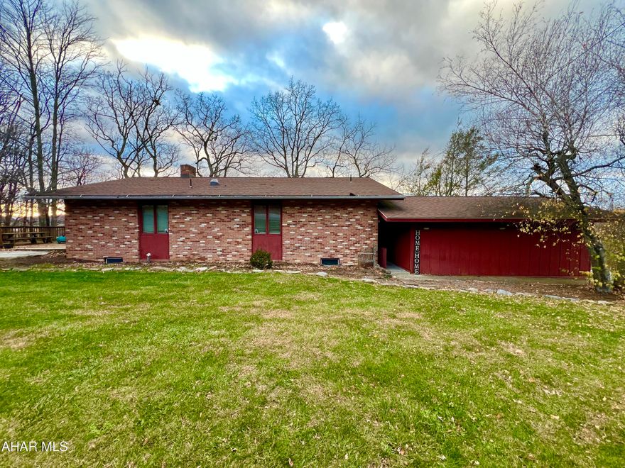 Well-maintained ranch home situated on 0.85 of an acre with beautiful views and a private setting. The main floor of the home offers three bedrooms and two baths, a living room, dining room with built-in shelves and cabinets, and a kitchen. The finished basement offers a large family room, an additional bedroom, a half bath, laundry area, and ample storage space. Outside, enjoy relaxing on the covered deck with stunning views, or entertain on the spacious side deck. The property also includes a two-car garage and a private yard, making it an ideal place to call home.