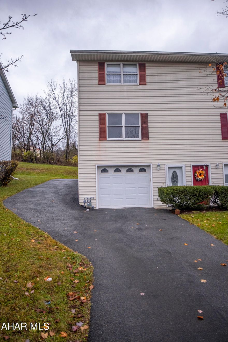 Beautiful Townhouse! Perfect Location! Meticulously updated and maintained by current owner!
This home has 2 bedrooms, 1.5 baths, and a 1 car garage. Spacious living room. Kitchen has a ton of cabinet space and an eat-in kitchen area. The cozy back porch is conveniently covered to enjoy in any weather. Newer roof and A/C unit - Central air. Also, an extended driveway for additional parking.