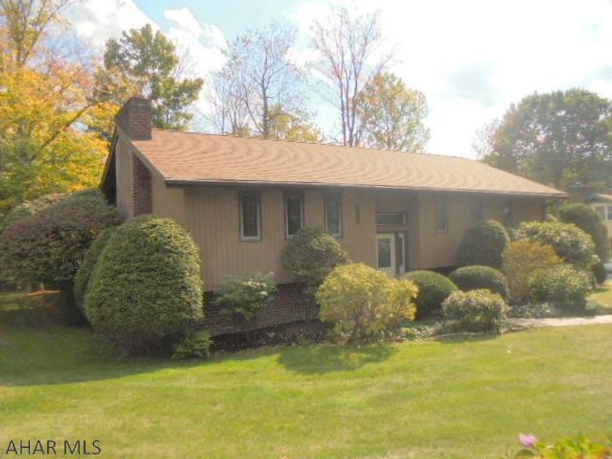 3 BR, 1 3/4 bath vinyl sided Split level. Updated kitchen. Large rear wooden deck. 1 car integral garage.