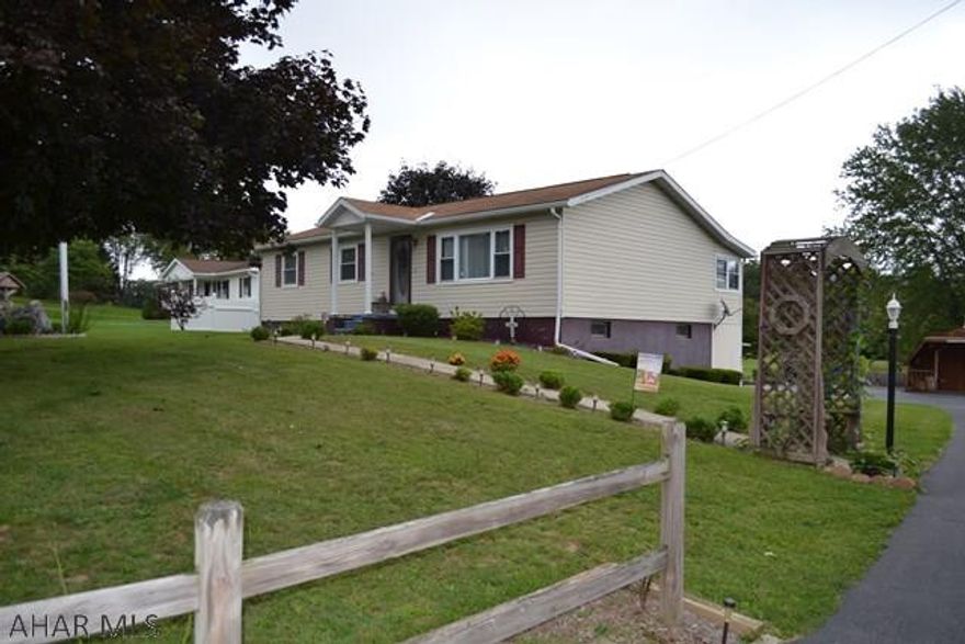 Wonderful outdoor spaces with this ranch home on 1.375 acres just 1 mile outside of Bedford.  3 bed 1.5 bath, updated kitchen with quartz counters and spacious living and family rooms.  Screened in back porch, deck, patio with fire pit, pergola, detached shed, paved driveway and much more.  Affordably priced at only 139,900!