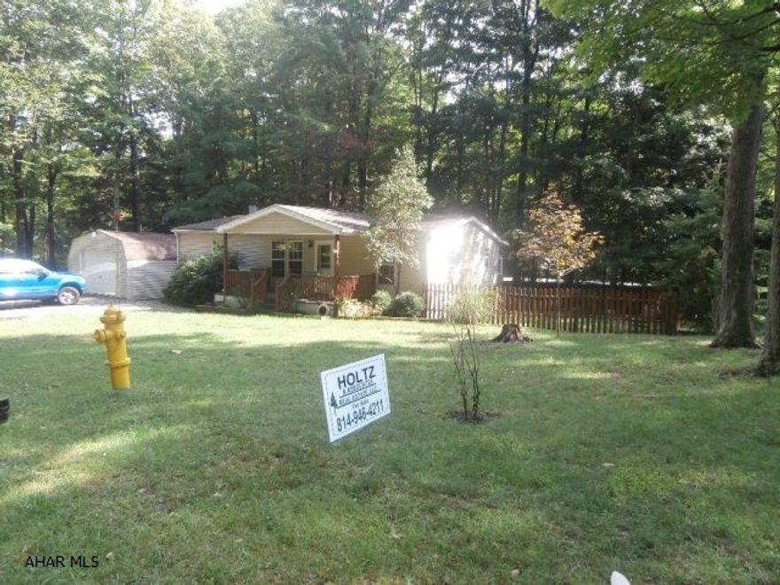 Well maintained doublewide on corner lot. Move in condition includes eat in kitchen and fireplace in living room, 3/4 bath off the master bedroom. Great property for the money.