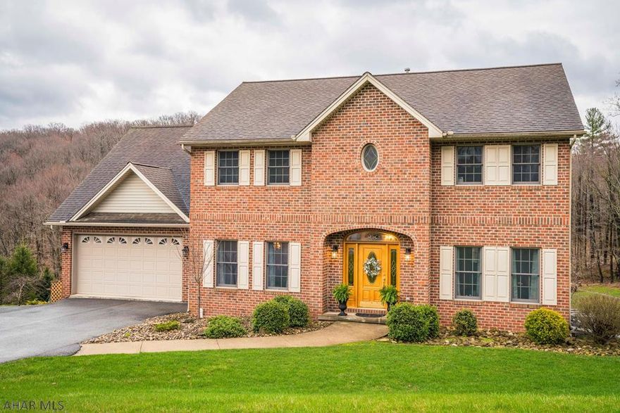 This home is an HGTV dream.....nothing to do but move right in!  New flooring, freshly painted, new light fixtures are a few of the pluses. The kitchen boasts gorgeous, rich Granite counter tops, SS appliances, breakfast bar and storage. Chilly nights are no problem...just cuddle up close to the fireplace.  The owner's suite has a walk-in closet and a fabulous bathroom...jetted tub is perfect for relaxing!  The kids can have their own space in the finished, walkout lower level. Laundry options on both the 1st and 2nd floors.   Enjoy evenings on the covered deck, patio or 3 season room while the kids run and play in the big yard. Central vac and radon systems are in place. Close to UPMC, Altoona Campus and Juniata Gap School. Homes like this don't come on the market often...a rare find!