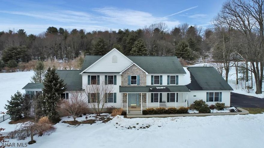 Check out this large country home!  This 5 bedroom, 3.5 bath house with an attached main level in-law suite that adds an additional 1 bedroom 1 bath to the home.  The home sits on 5 private acres, including partially wooded with a firepit and walking/bike trail, open field, and large beautifully landscaped yard with is fully fenced.  The yard includes 2 gazebos and a waterfall/pond feature.  The house has lots of upgrades, including newly remodeled kitchen with quartz countertops and huge island, 3 season room, new master bath including large custom tile shower, soaking tub, custom closet, and lots of other upgrades.  The attached apartment on the main level and has its own kitchen, laundry, dining, living room with a great view, bedroom, and bath. LISTING AGENT LISCENCED PA REALTOR