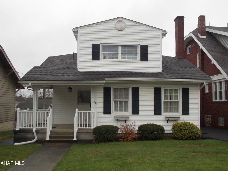 Cute bungalow with white siding and black shutters in a convenient location in Altoona.  The home is very close to a Sheetz store and lots of shopping or restaurants. As you walk into the living room from the covered front porch you will notice the lovely wood burning fireplace with a large mantle.   This large room is a great place to entertain and welcome family and friends.  
The eat in kitchen also has an exterior door to the side of the house.  The first floor has 2 bedrooms but one of them was used as a den for the family.  The bath is on the first floor.  Upstairs is a small room for homework or a great place for kids to do homework or play video games.  They are also 2 bedrooms on this floor.
The laundry is in the basement and the W and D stay but a section could be a finished family room.  The laundry walks out to the back yard and the large 2 car garage. This home has a lot to offer it just needs a new family to make it HOME.