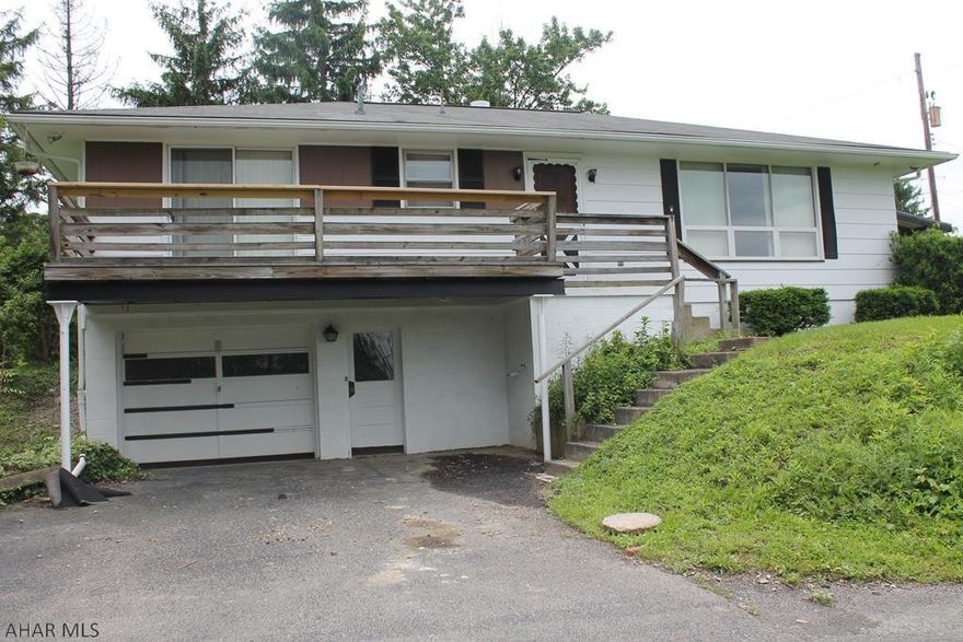 Beautiful rural Altoona home. Enjoy the convenience of one story living in this three bedroom home on wooded double parcel.  Easy to spend time outdoors with a covered deck and porch. Large bedrooms, one with sliding glass doors accessing the deck and others two with hardwood flooring. Fully finished basement give you all the extra room needed for entertaining company and a second bath. Large eat in kitchen with brick backsplash and the option on formal dining in the dining room. Beautiful naturally finished trim throughout the home and an integral garage. Close to all the conveniences of the Altoona area while giving you a rural feel.