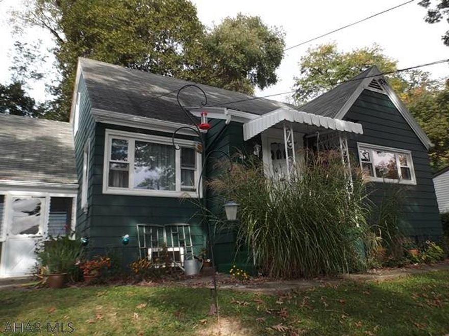 Lovely Llyswen home with 3 bedrooms.  New floor coverings on first floor.  Newer vinyl thermopane windows, waterproofed (with warranty) basement with sump pumps.  New water heater in 2015.  Basement partially finished as a large family room with bar.  Second room for exercise area, child's play or computer room.  Second floor bedroom features many built in storage areas and several closets, one cedar.