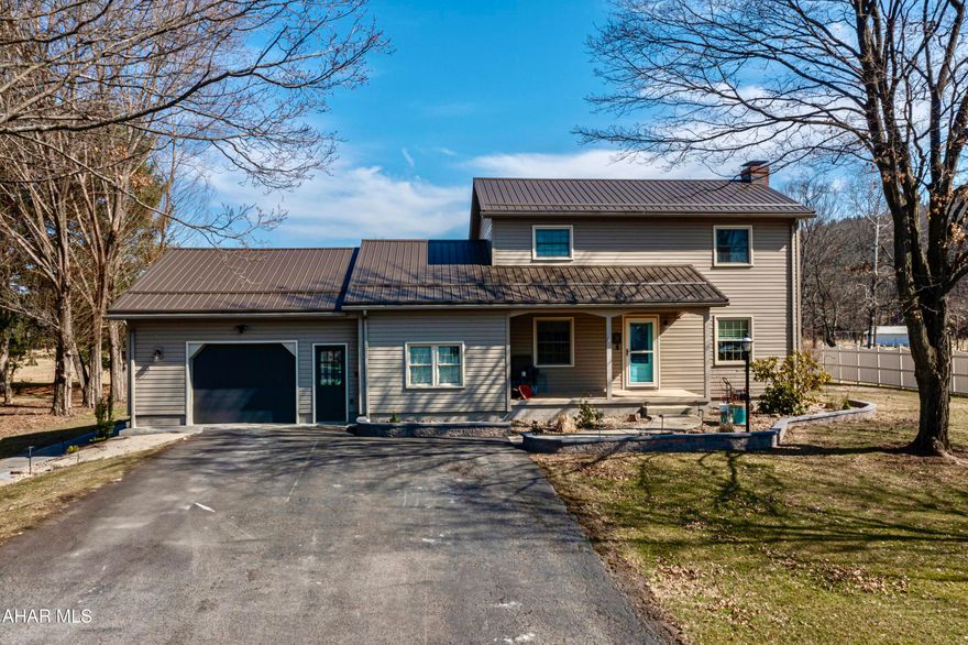 This updated two-story home in Duncansville has so much to offer! The first floor features beautiful hardwood flooring throughout most of the space, including the formal dining room and living room. From the kitchen, you can access a covered back porch, which is next to a screened-in porch. Just off the kitchen, step down into an additional family room with access to a mudroom that separates the garage from the home. Upstairs, you'll find four spacious bedrooms and a full bath. The home is equipped with mini-split heat pumps throughout, and the seller has recently installed a new roof.