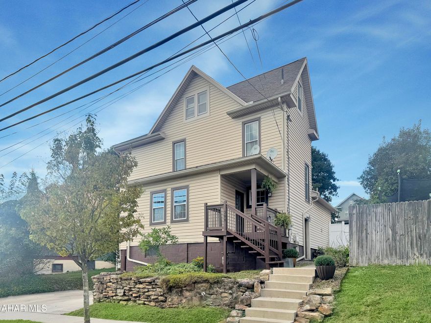 Experience timeless elegance & modern convenience at 309 W Ogle Street, a beautifully appointed home in the heart of Ebensburg Borough, just steps from the courthouse. This residence boasts soaring 9.5-foot ceilings on the main level, enhancing the sense of space throughout its stunning living areas, including a hardwood-floored living room, elegant dining room, expansive kitchen w/ included appliances, & the added luxury of a first-floor full bath, laundry, & a heated mudroom. Upstairs, you'll find three generously sized bedrooms & a stylish full bath, while a partially finished walk-up attic offers endless possibilities for additional living or entertaining space. The lower level provides excellent storage & houses the home's mechanicals. Outside, enjoy a lifestyle of comfort & convenience w/ a private 1-car garage, ample off-street parking, a fully fenced yard, paver patio, & two storage sheds. A rare opportunity to own a sophisticated property in a prime location, schedule your private showing today!