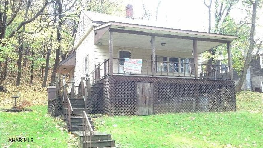 Older home, needs updating - nice 1/2 acre lot boarding a stocked fishing stream. Little fixer upper or investment to resell. Bring ofers! SOLD AS IS