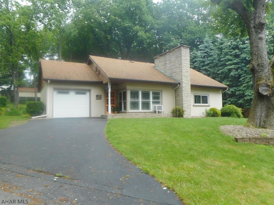 Great Sinking Valley location - 1.5 story on just under an acre lot. Equipped kitchen, dining area, living room with vaulted ceiling and fireplace. Nice first floor office. Cedar closets. Basement family room. Attached garage and detached carport. Large rear covered patio.