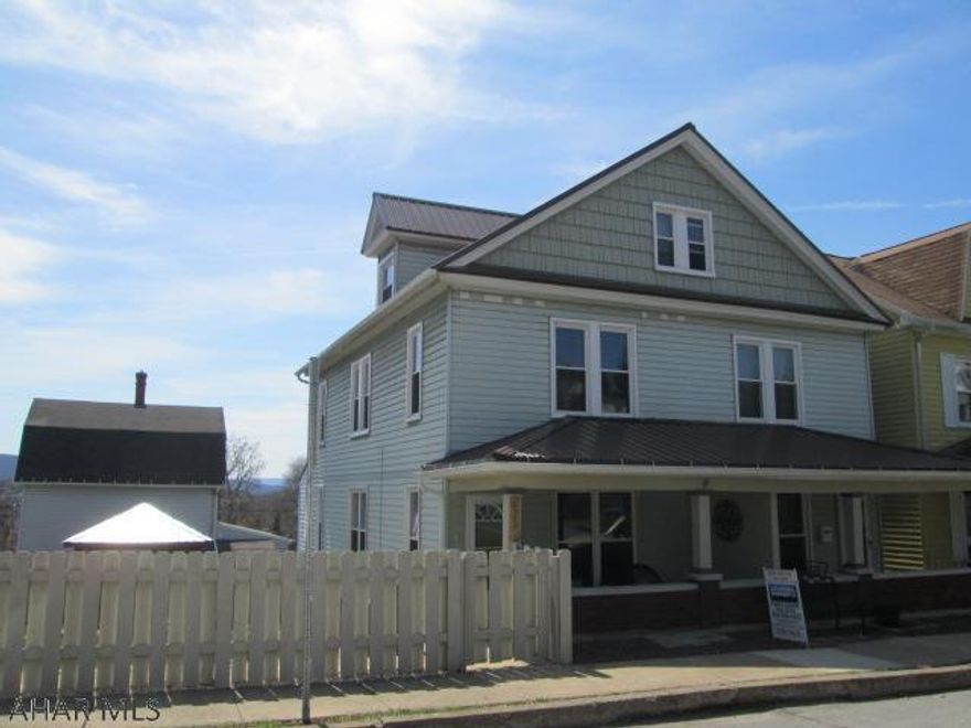 Altoona double house.  Great opportunity!  This unique property has been improved beyond imagination.  The beautiful kitchen features hickory cabinets, top of the line Whirlpool appliances, nice island and 1/2 bath.  The first floor has cork flooring and bamboo floors in the 1/2 bath.  One side has a chair lift to the second floor.  This home is perfect for handicap accessible or older parents and the other side for care-takers.