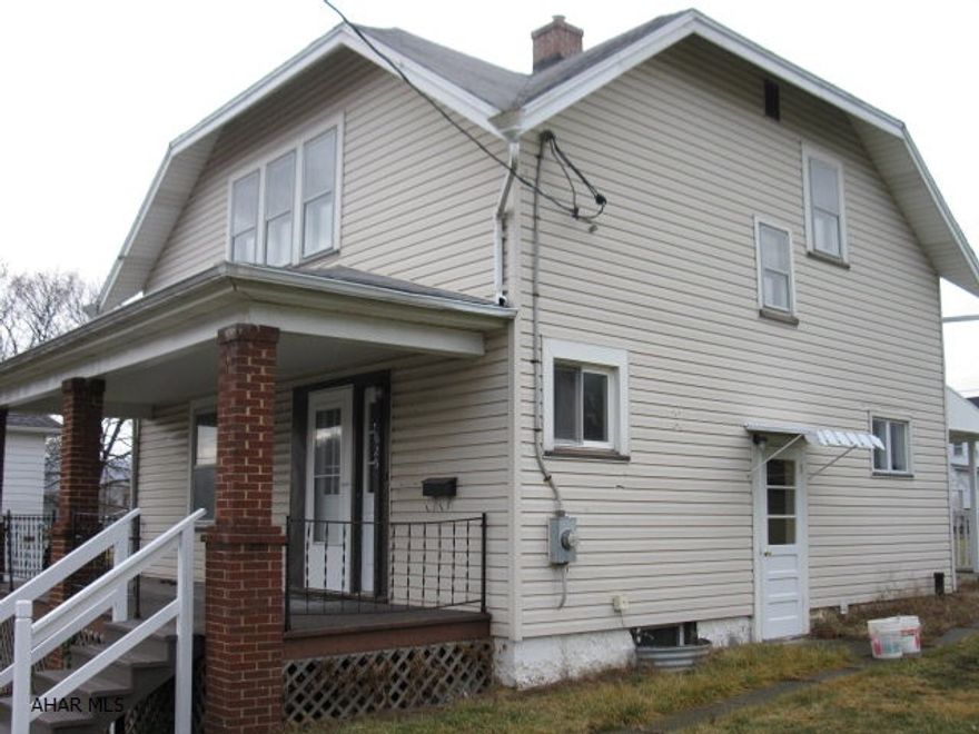 LIKE BRAND NEW! Total interior remodel.  New kitchen with dishwasher and microwave/range hood combo, new bath, drywall, flooring, doors and fixtures.  Newer furnace and thermo windows with central air unit to be installed prior to closing weather permitting. Large level yard with alley access and off street parking, two sheds and front porch with a great view.  Walk to YMCA, parks and playgrounds.  Great opportunity to own a like new home for under $100,000!