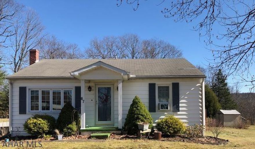 2 Bedroom ranch home close to Country Club. Beautiful hardwood throughout. Home has a one car attached garage, nice deck and a shed.