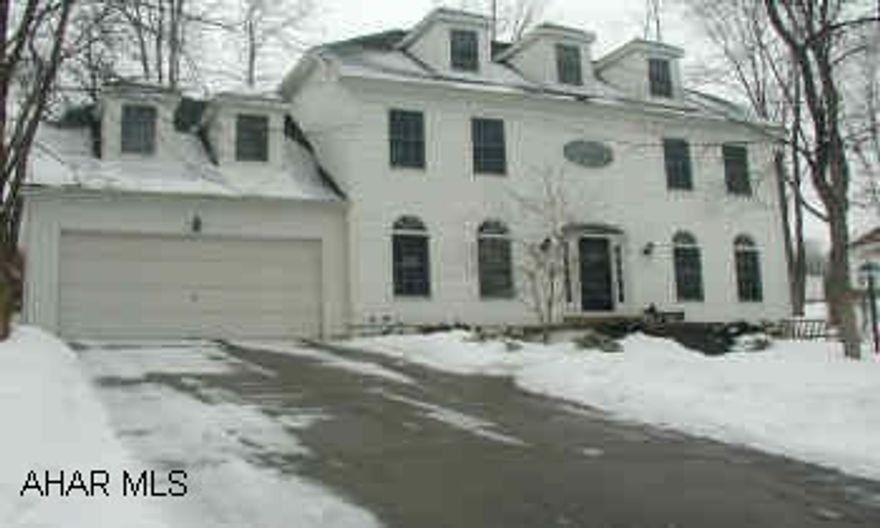 HOME ON DEAD END STREET ON LARGE WOODED LOT (SIDE LOT INCLUDED IN LOT SIZE)  BEAUTIFULLY DECORATED.  CHERRY KITCHEN WITH EATING AREA.  SEPARATE STAIRCASE OFF KITCHEN.  THIRD FLOOR COULD BE FINISHED.