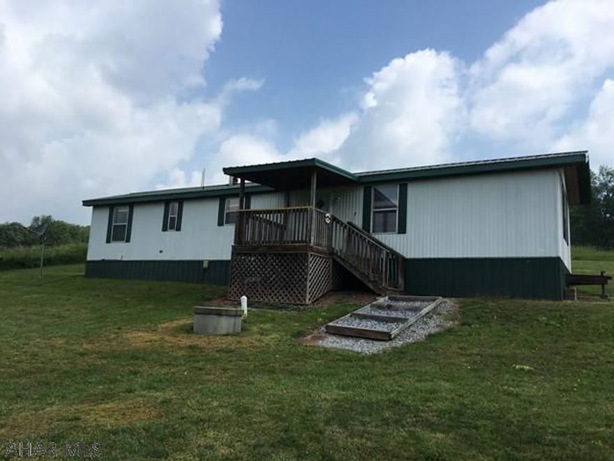 Very nice clean update 1994 single wide mobile home. Completely renovated. New kitchen cabinets, new appliances, new bath tub, carpeting and linoleum. Freshly painted. Kerosene heat and central air. Well water and septic sandmound. Landlord will mow grass and tenant will take care of there own snow removal.  Additional storage in the barn space of 1 car garage.  No pets!!! No smokers! Credit check and must have references.  There are security cameras.