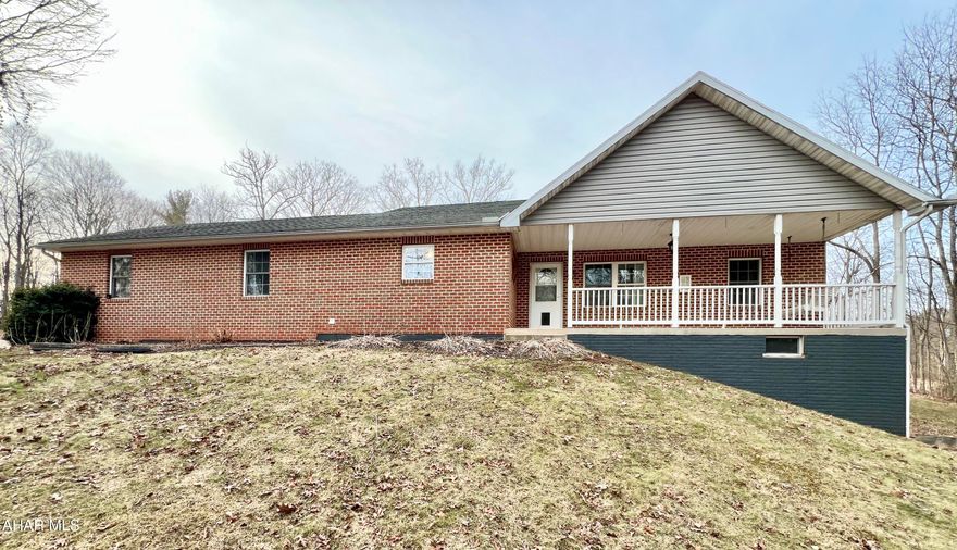Looking for a private getaway or a forever home surrounded by nature? Then take a look at this well-maintained 3-bedroom, 2-bath home nestled in the woods resting on 2.6+/- acres. This home offers an open concept with a living room, dining room, eat-in kitchen, 3 bedrooms, 2 baths, and a mud-room with laundry. Additionally, the home has an attached two-car garage and walk-out basement. Outside you will find a covered front porch, large deck, and an oversized run-in shed. The setting of this property provides an excellent place to get away from the hustle and bustle of life and enjoy the outdoors, being conveniently located minutes away from Buchanan State Forest and offers easy access to I-70, I-68, and the PA Turnpike.