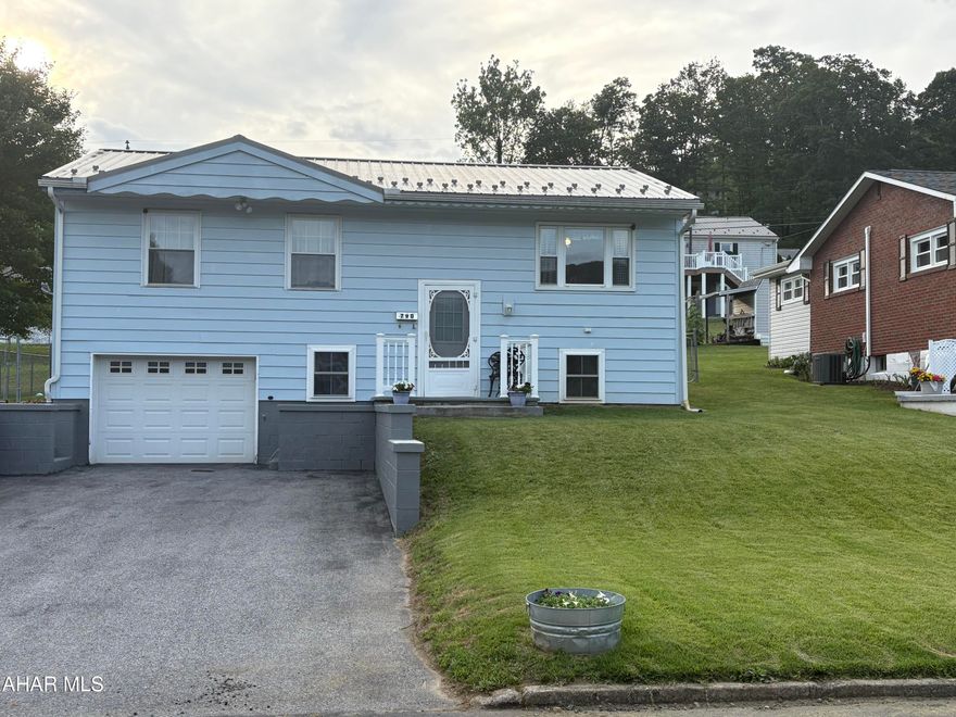 Beautiful well maintained home in Bedford Borough.   This home has an eat in kitchen,  living room, and laundry all on main level with an additional great room on lower level. A private back porch over looks the fenced-in, nicely manicured back yard.  It comes with a shed for extra storage for lawncare equipment., work shop or craft area.   Plenty of room for a garden or raised flower beds.  Close proximity to all major highways, Bedford Springs, and downtown.