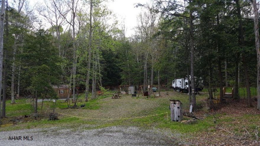 Two beautiful wooded lots in Glendale Yearound. W/S and electric are already to property. 18 x 12 shed with electricity comes with the property. Glendale Yearound is a gated community with community pool, tennis, basketball, and other activities only minutes from Glendale Lake. CAMPER ON SITE IS NOT INCLUDED WITH PROPERTY.