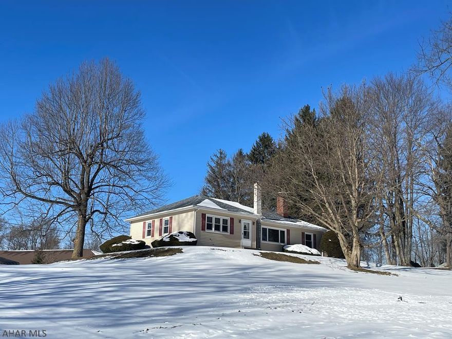 This well maintained ranch house sits on a half acre lot in Cresson.  Enter through the kitchen with updated cabinets and flooring, appliances are included, dining room off of kitchen.  Entertain family in the spacious family room, or get cozy with a fire in the fireplace.  Both bedrooms are large with double closets.  The basement is unfinished, has potential for additional living space as it is as large as the upstairs.  This home features hardwood floors, and a new roof.  Macadam driveway, and one car garage for covered winter parking.  Shed is great for all your gardening supplies.  Call today.