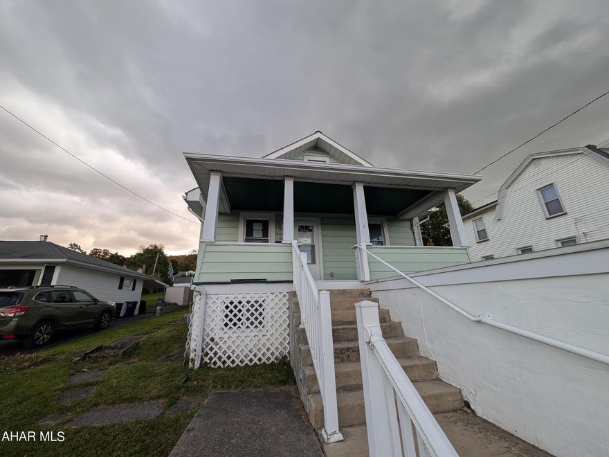 Lakemont area one and a half story home on quiet, peaceful street. Features 2 first floor bedrooms and bath, large living room,  dining room and laundry. Second floor with  additional bedroom, bath and storage closet. Basement includes integral 1 car garage, front and rear covered porches. May qualify for seller financing (Vendee). Buyer pays both transfer taxes.